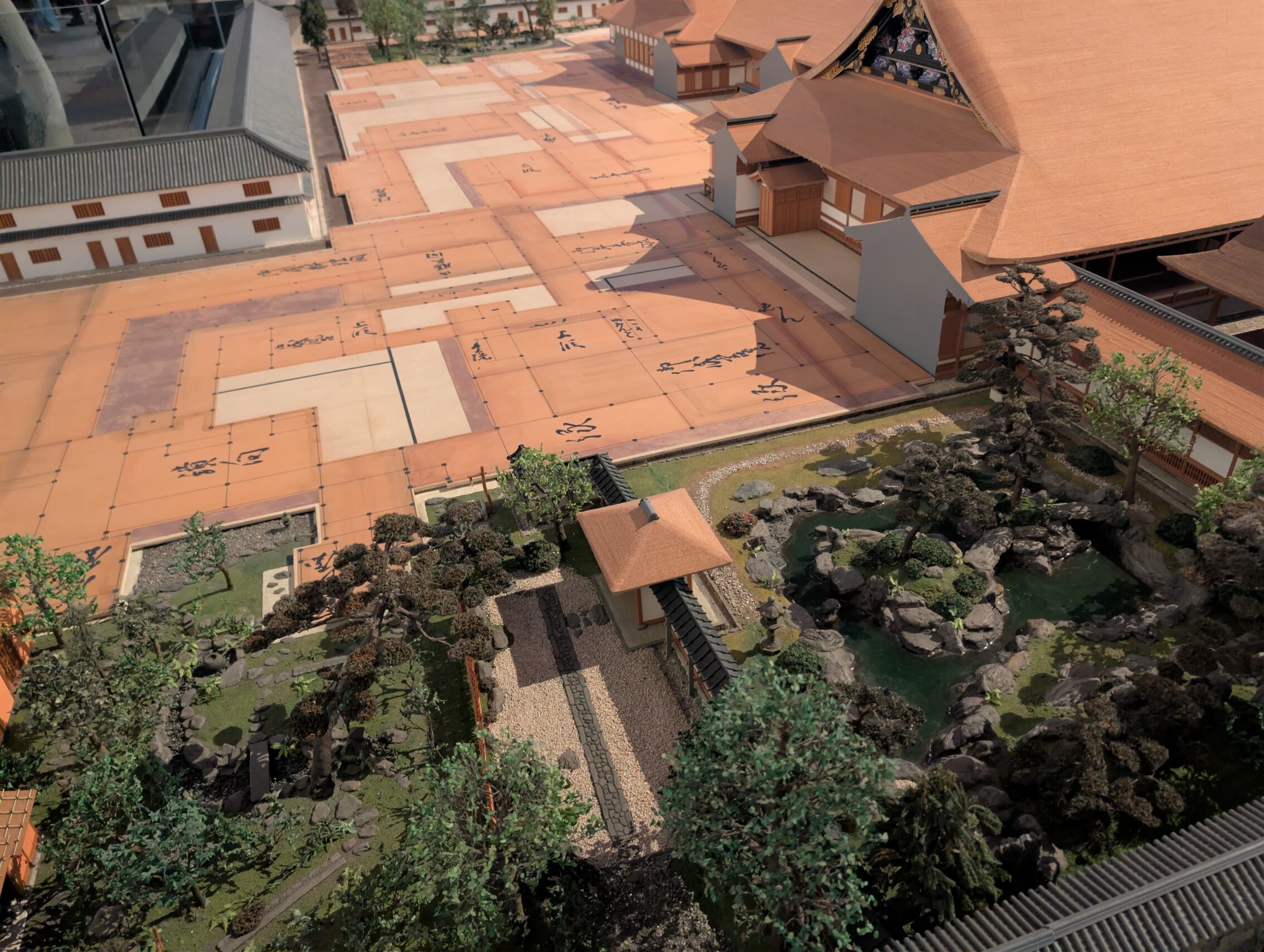 Scale models of a garden and some houses.