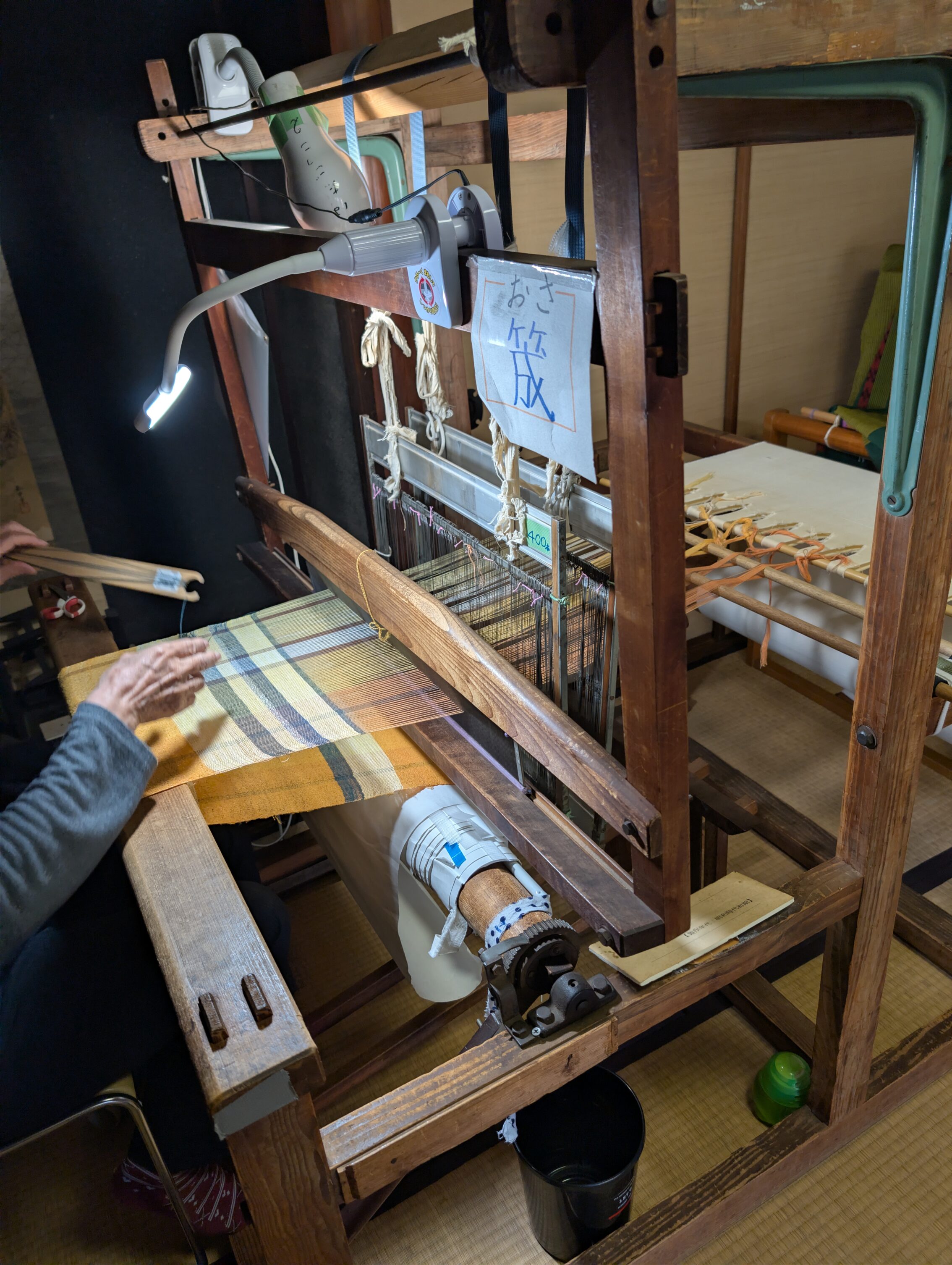 A loom being used.