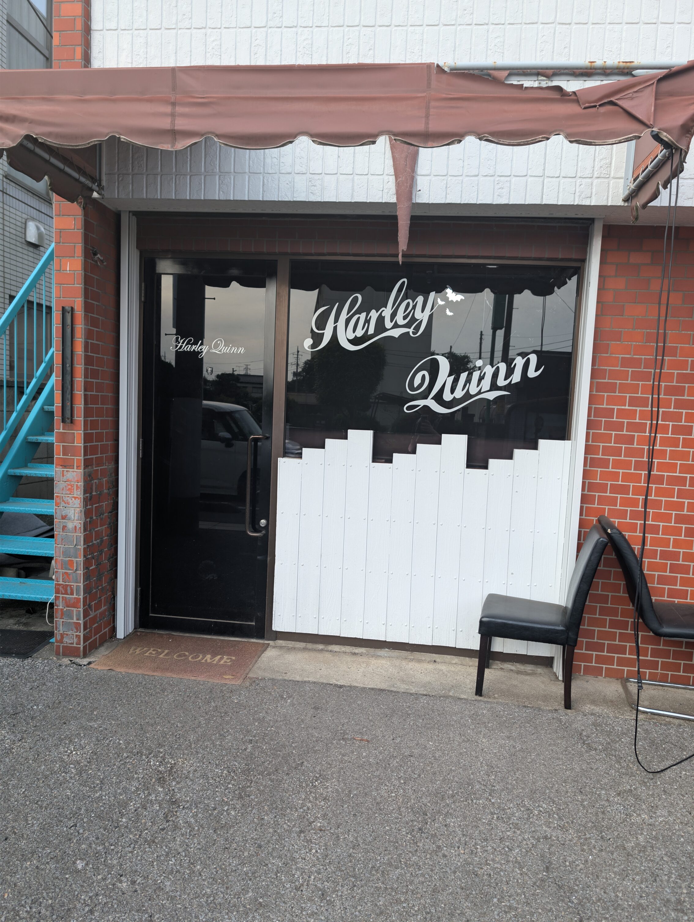 An empty and abandoned shop called "Harley Quinn".