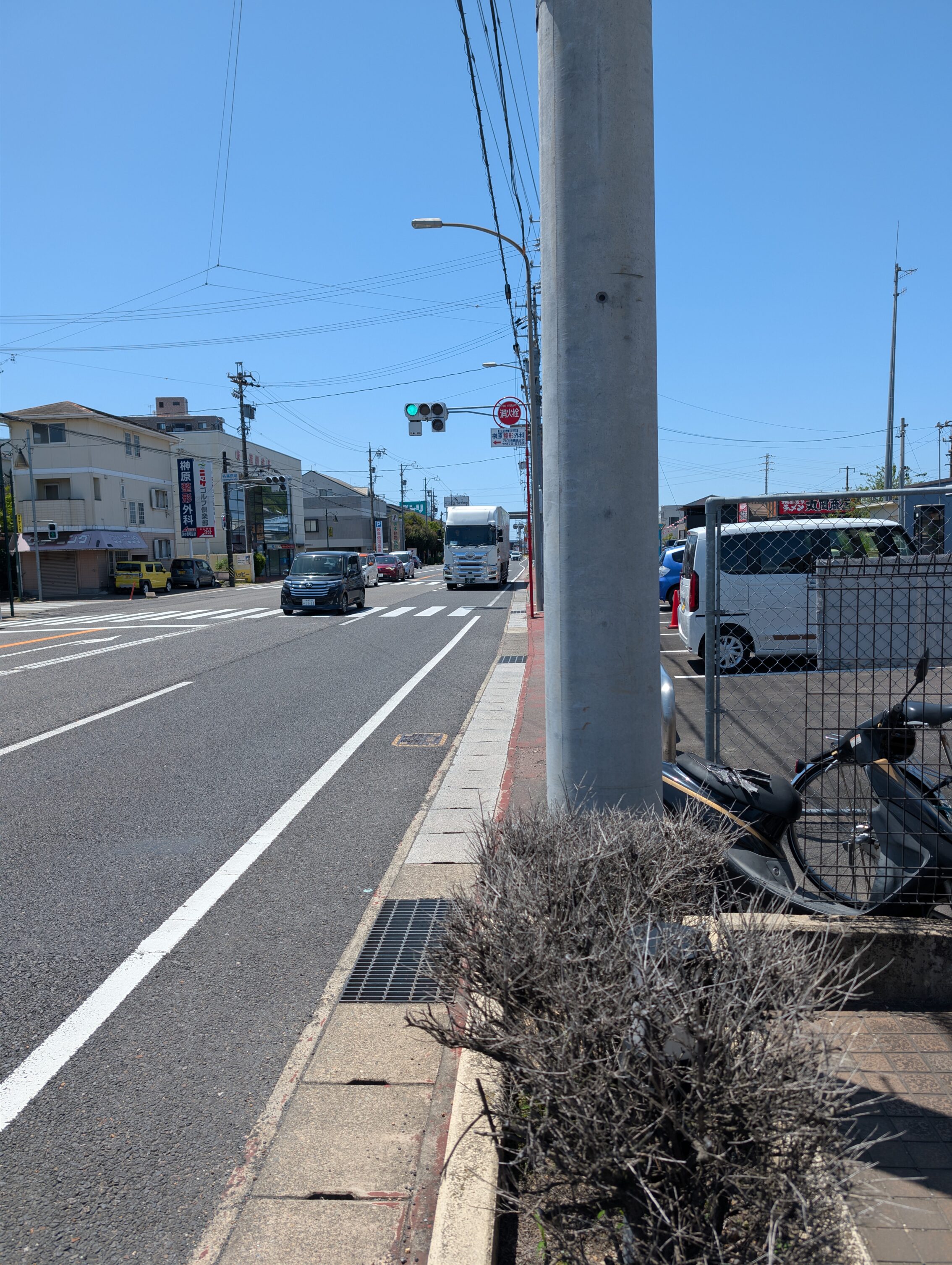 A four-lane highway, with a disappering pavement.